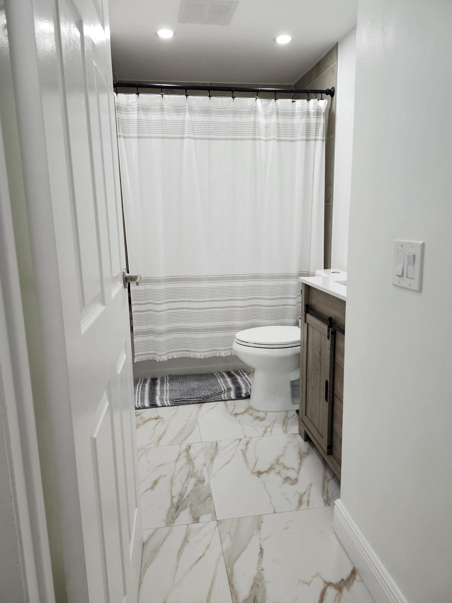 1473 Donwoods Lane Royal Palm Beach, FL 33411 - Photo 59 of 95 Guest Bath