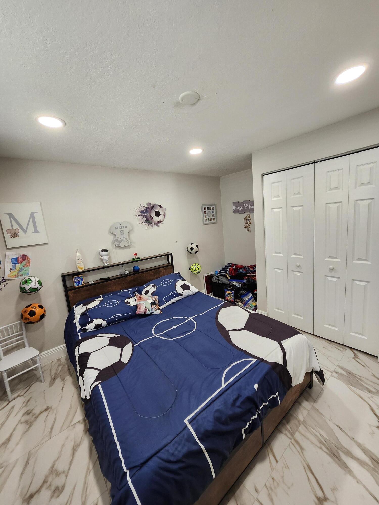 1473 Donwoods Lane Royal Palm Beach, FL 33411 - Photo 92 of 95 a living room with furniture and wooden floor