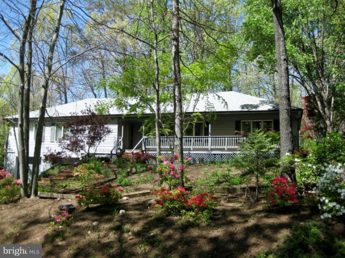 301 Happy Creek Road Locust Grove, VA 22508 - Photo 1 of 30 Stately exterior with front porch