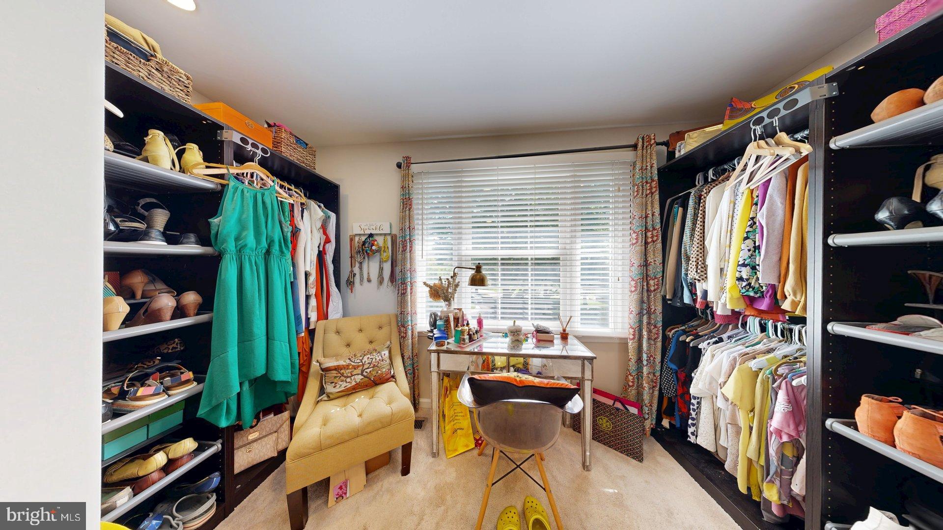 11901 Rustic Farm Court Germantown, MD 20874 - Photo 52 of 134 Chic closet with vibrant style options.