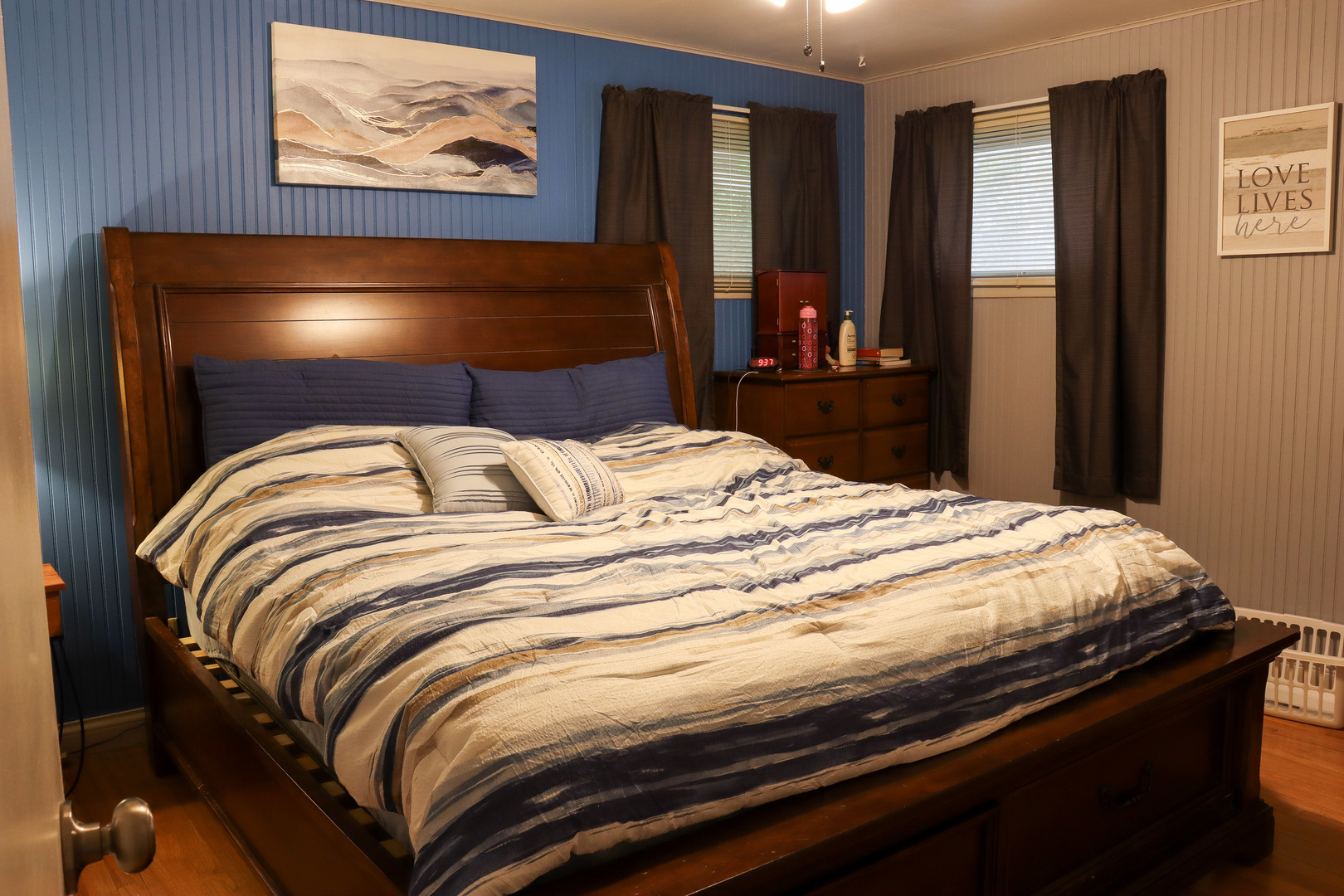 523 Barden Street Morrison, IL 61270 - Photo 19 of 37 a bedroom with a bed and a painting on the wall