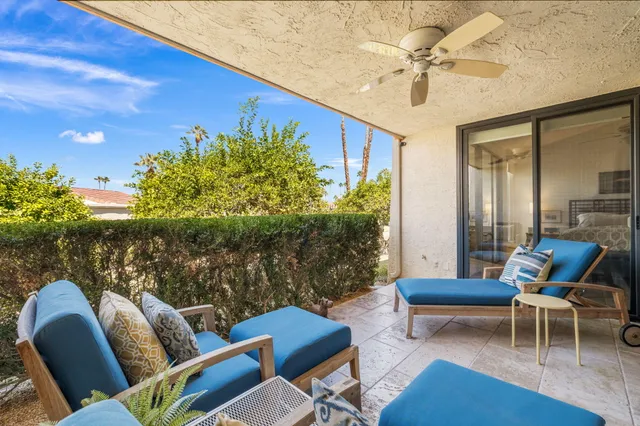 a outdoor living space with furniture and garden view