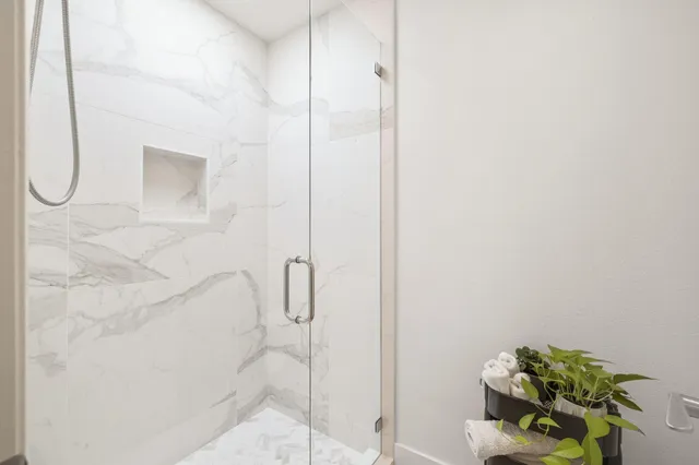 a kitchen with a sink appliances and cabinets