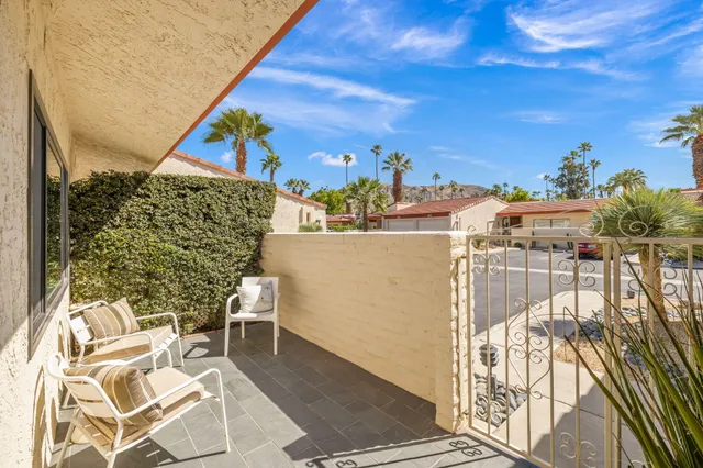 a view of a balcony with lake view and ocean view