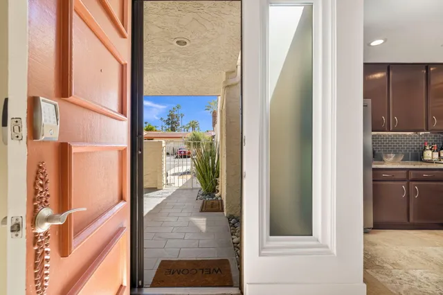 a view of a bathroom from the hallway
