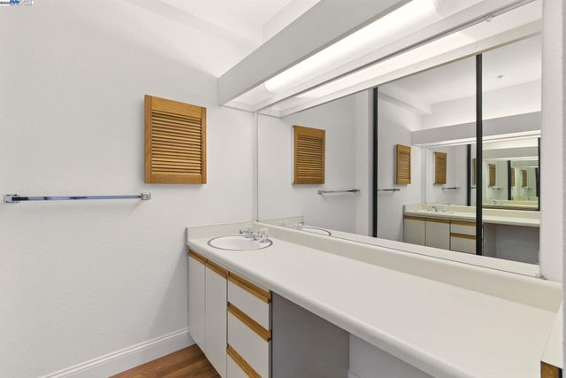 a bathroom with a shower and a toilet