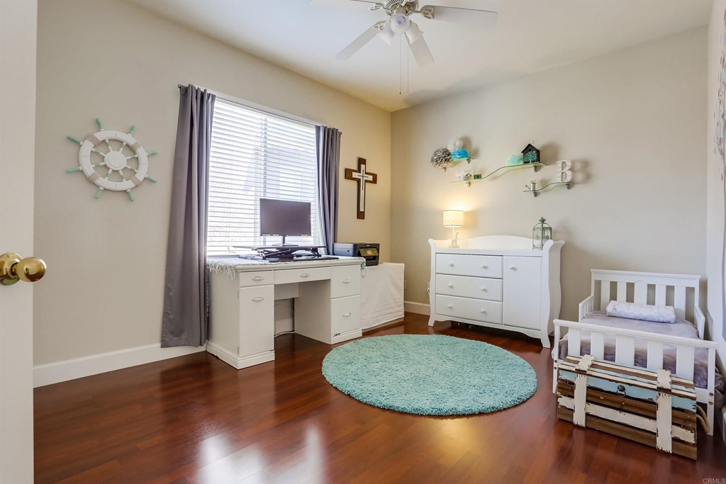 6094 Citracado Circle Carlsbad, CA 92009 - Photo 12 of 28 a room with cabinets and window