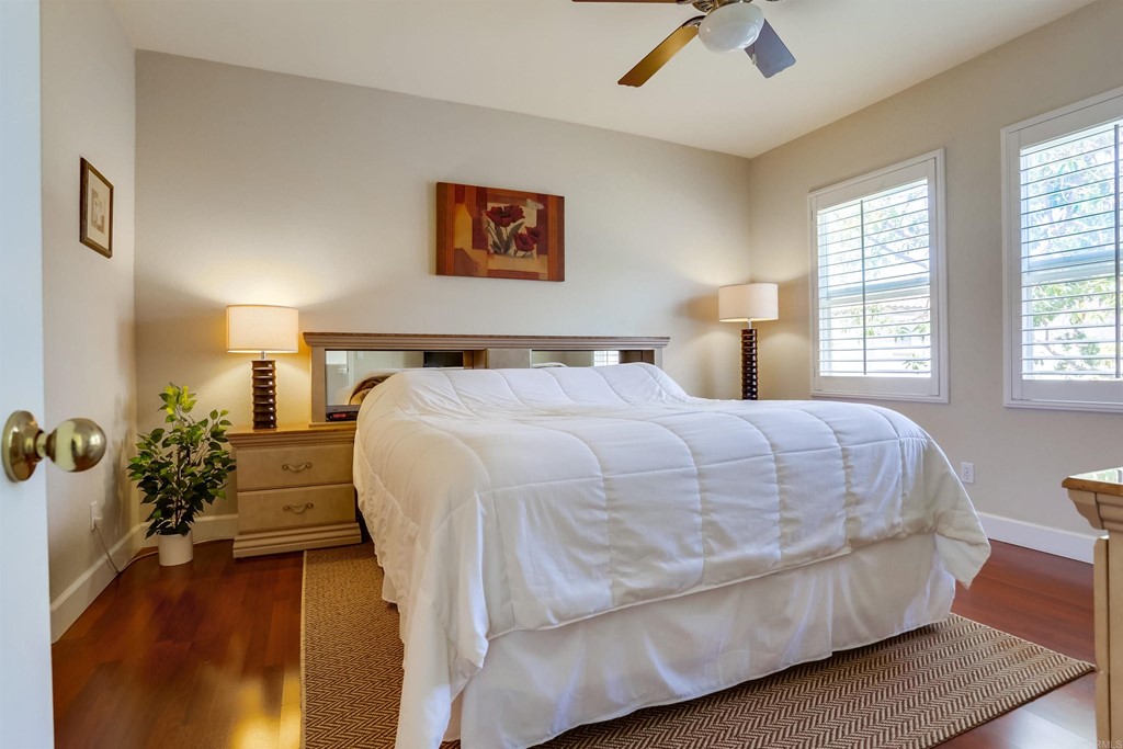 6094 Citracado Circle Carlsbad, CA 92009 - Photo 14 of 28 a bedroom with a bed and window