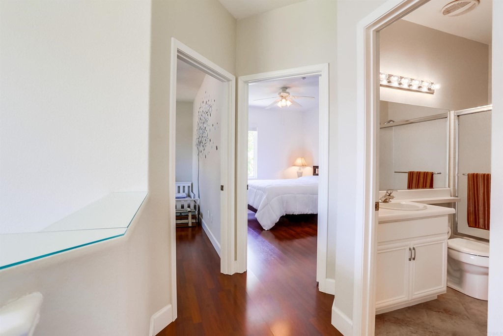 6094 Citracado Circle Carlsbad, CA 92009 - Photo 18 of 28 a room that has a bed and a view of bedroom