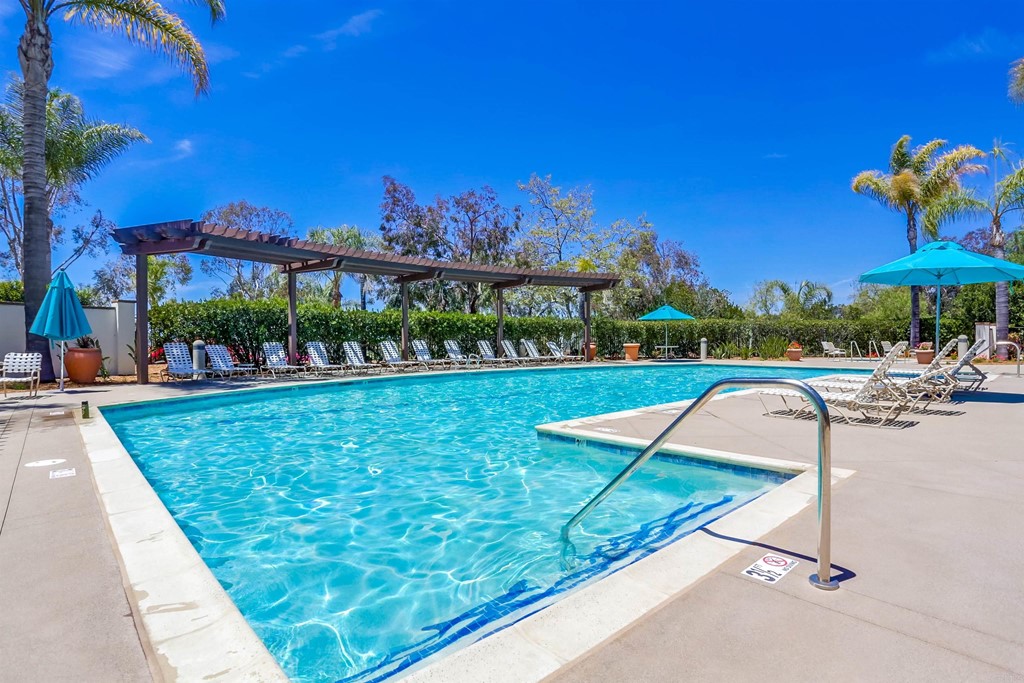 6094 Citracado Circle Carlsbad, CA 92009 - Photo 24 of 28 a view of a swimming pool and a yard