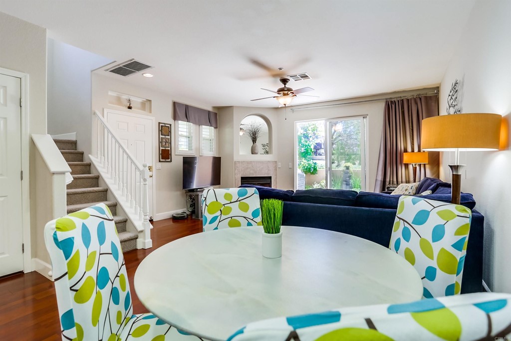 6094 Citracado Circle Carlsbad, CA 92009 - Photo 7 of 28 a living room filled with furniture and a table