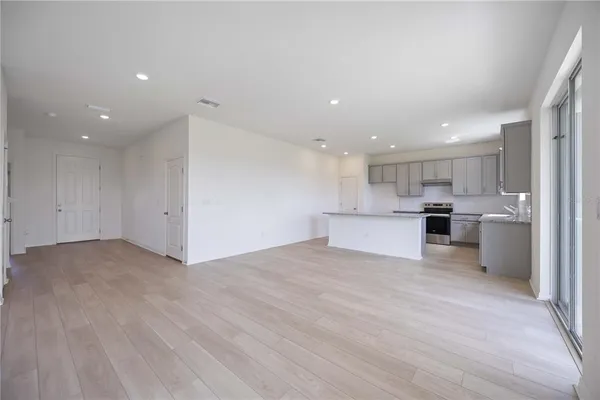 a view of kitchen with wooden floor