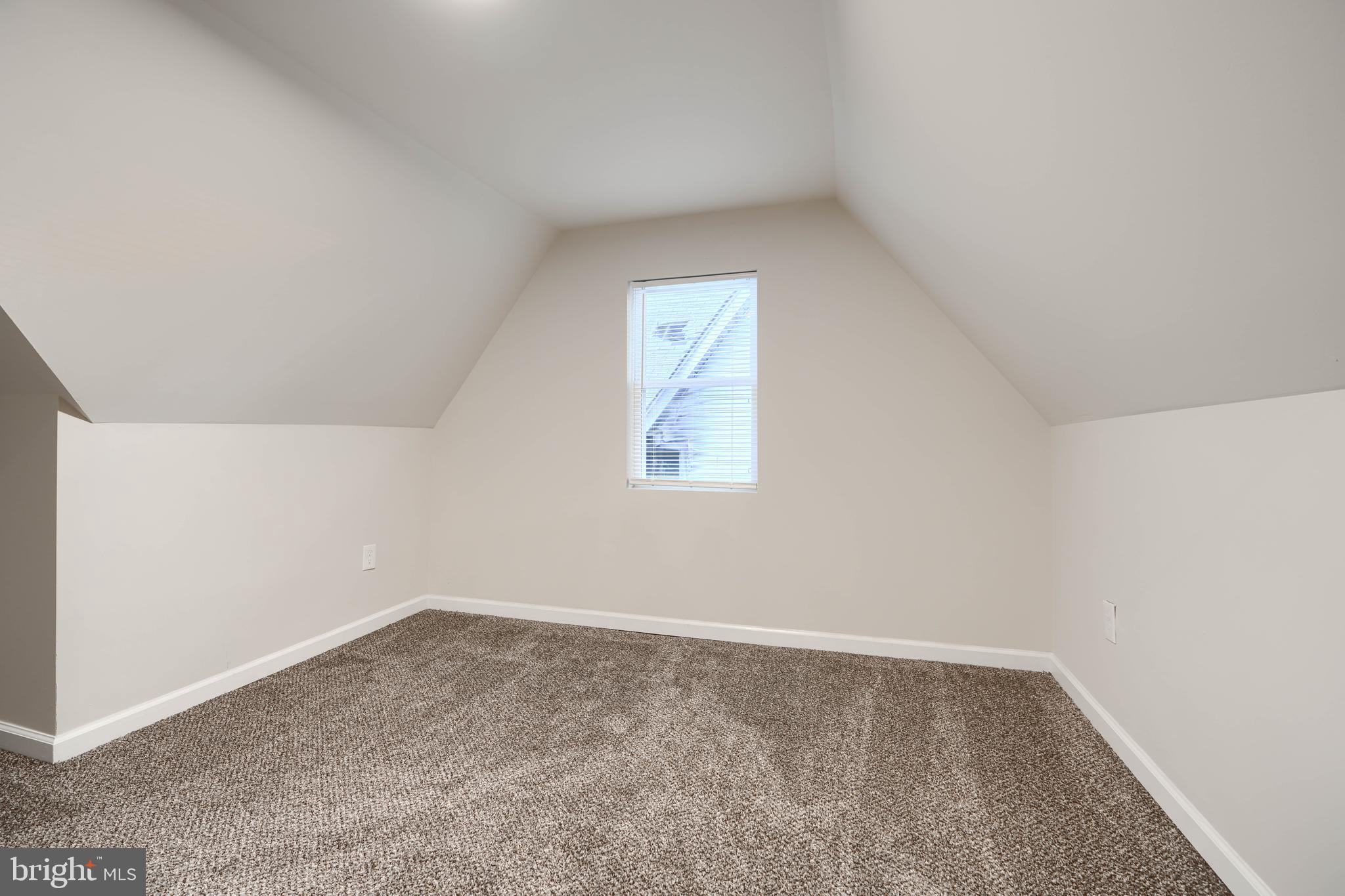 3308 Walbrook Avenue Baltimore, MD 21216 - Photo 28 of 32 an empty room with a window