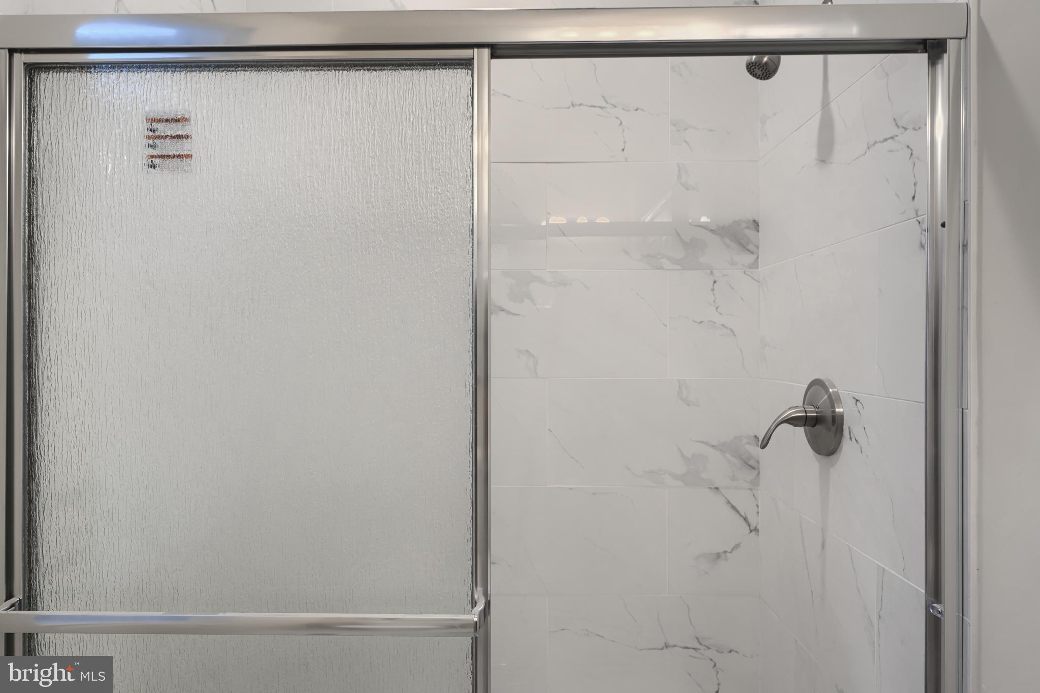 3308 Walbrook Avenue Baltimore, MD 21216 - Photo 29 of 32 a bathroom with a shower