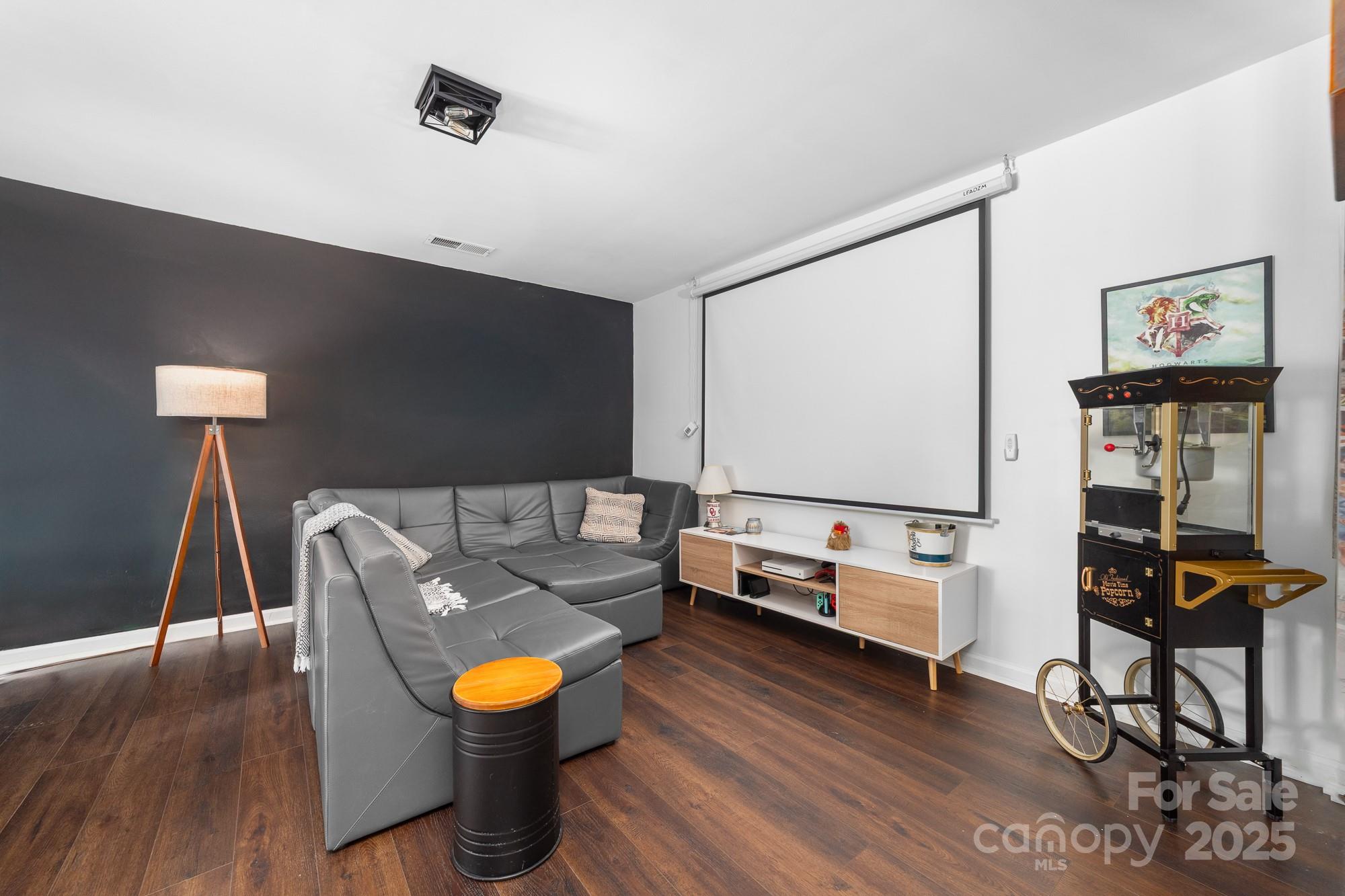 1542 Maypine Commons Way Rock Hill, SC 29732 - Photo 16 of 36 a living room with furniture and wooden floor