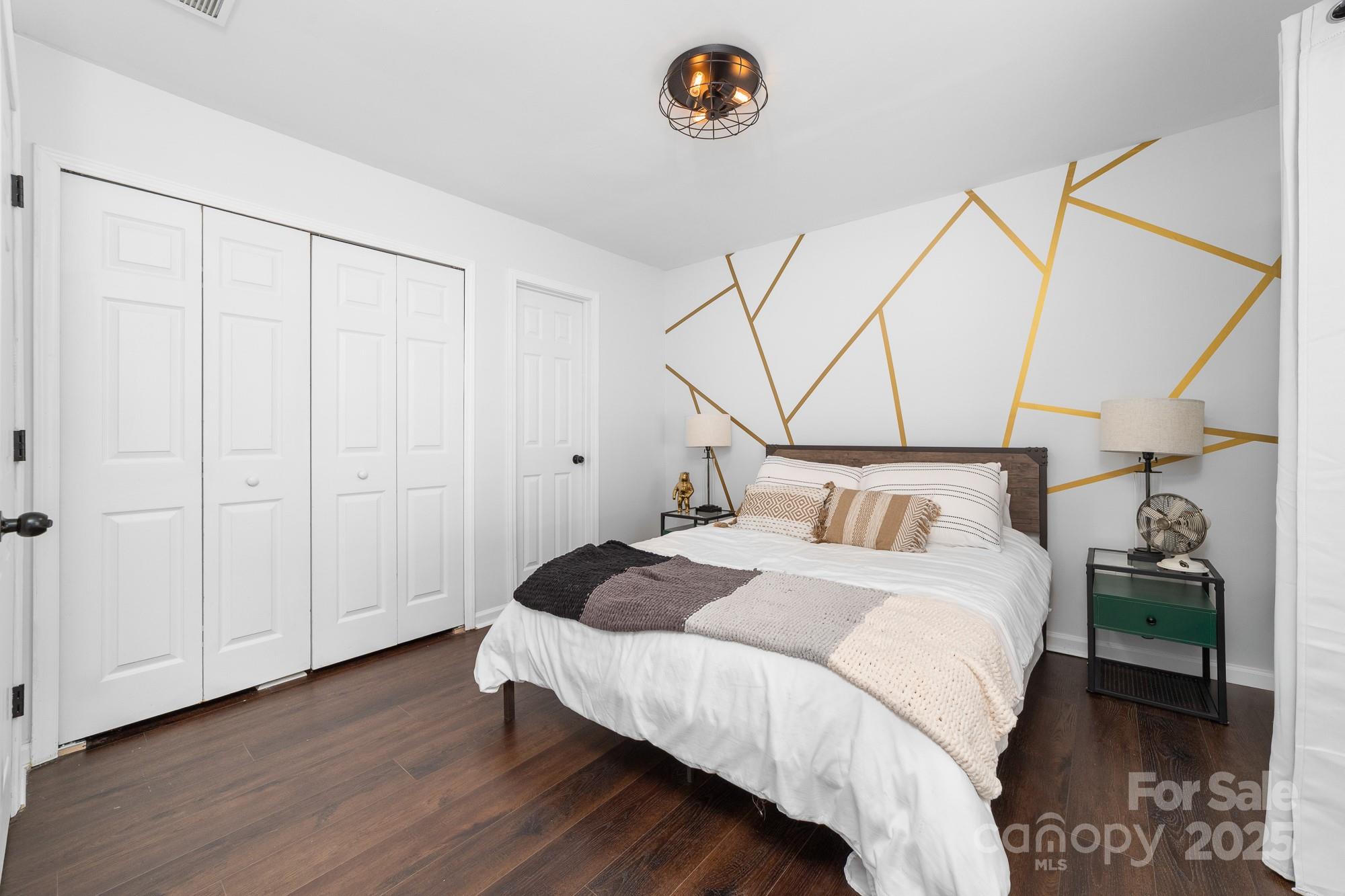 1542 Maypine Commons Way Rock Hill, SC 29732 - Photo 21 of 36 a bedroom with a bed and a table