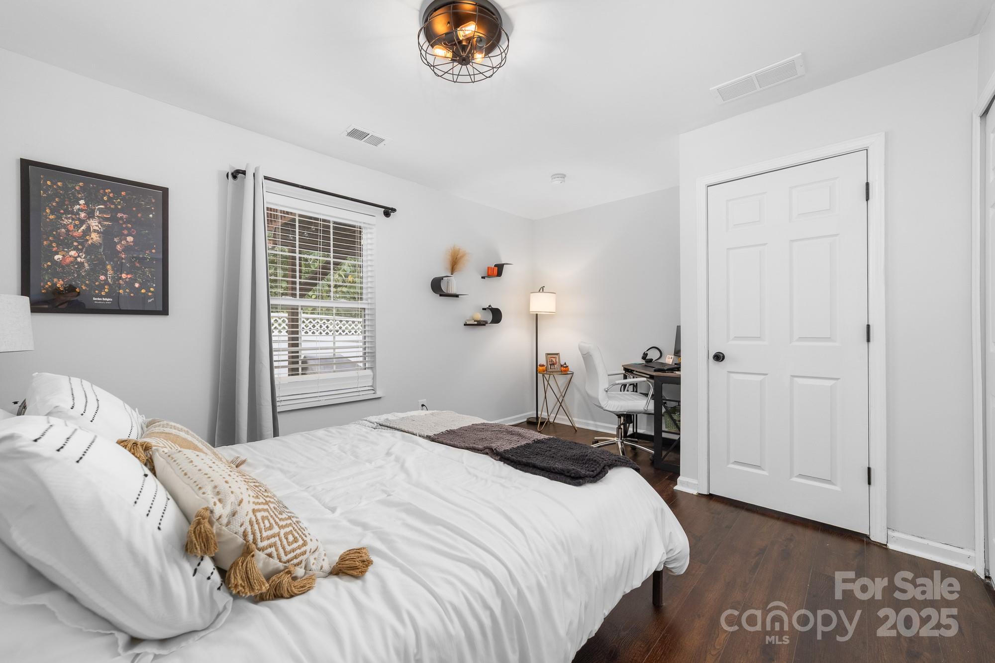1542 Maypine Commons Way Rock Hill, SC 29732 - Photo 22 of 36 a bedroom with a bed and a window