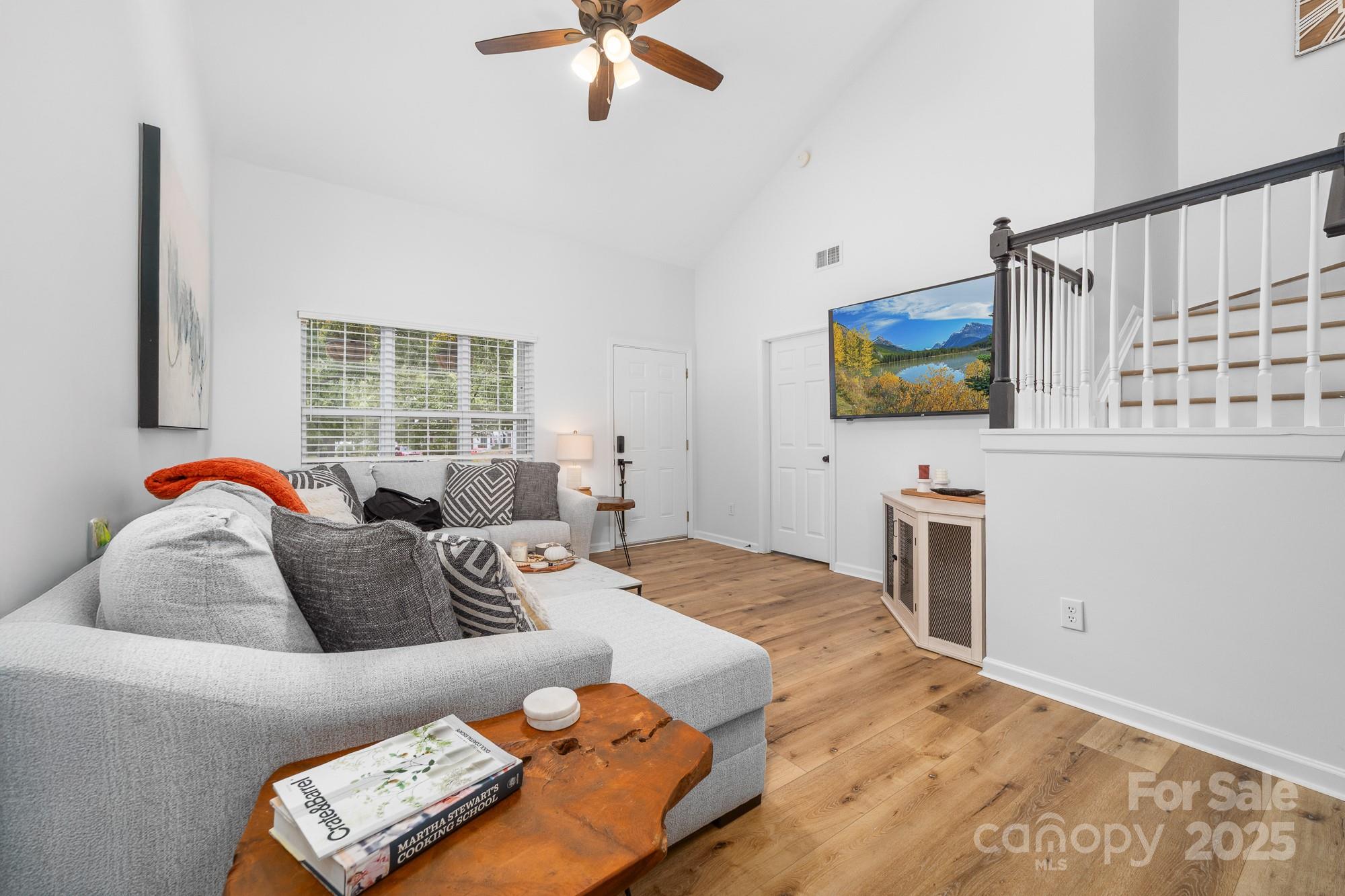 1542 Maypine Commons Way Rock Hill, SC 29732 - Photo 5 of 36 a living room with furniture and a flat screen tv