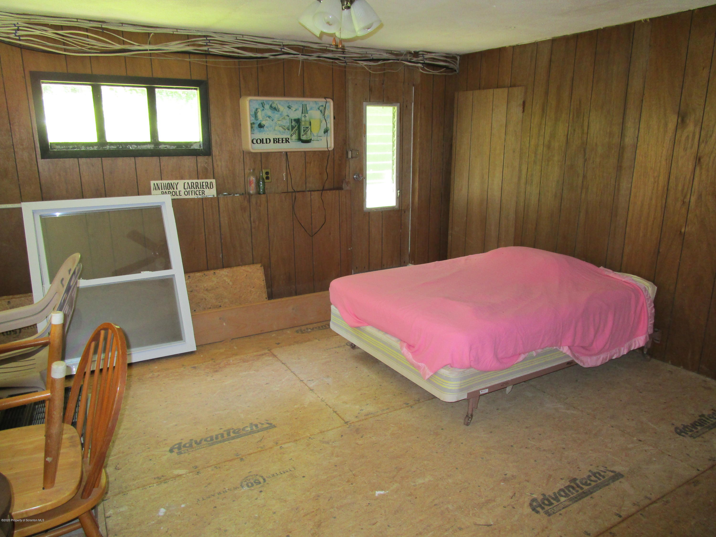 1815 Melrose Road Susquehanna, PA 18847 - Photo 8 of 11 a bedroom with a bed and a window
