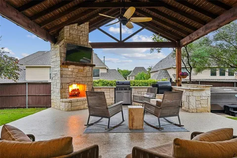 a outdoor space with patio the couches and a potted plant