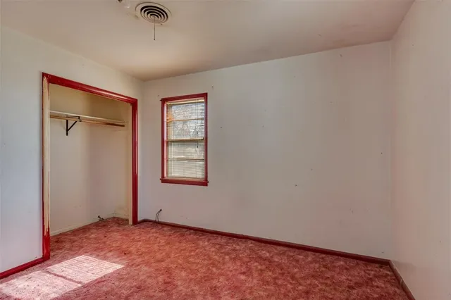 an empty room with a window