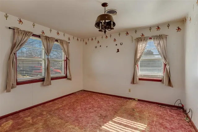 a bathroom with a toilet sink and tub