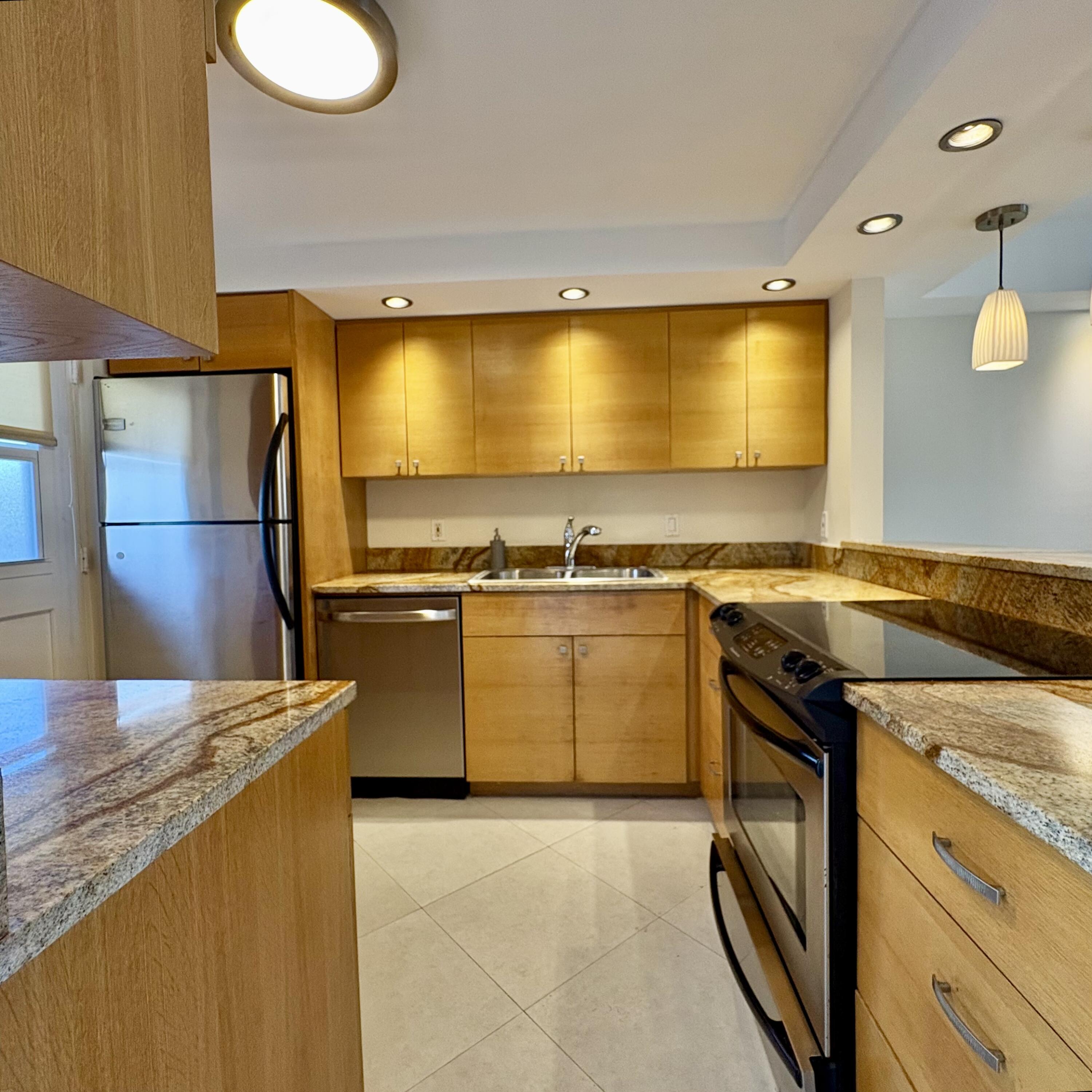 5700 Northwest 2nd Avenue, Unit 203 Boca Raton, FL 33487 - Photo 7 of 29 KITCHEN
