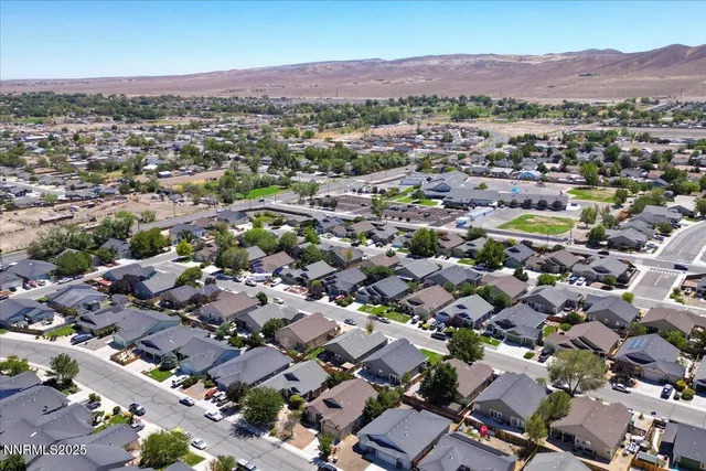 an aerial view of a city with lots of residential buildings