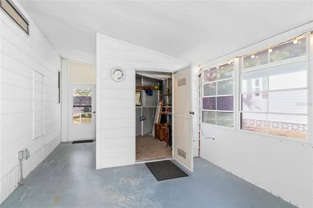 a kitchen with stainless steel appliances granite countertop a refrigerator and a stove