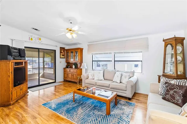 a living room with furniture and a window