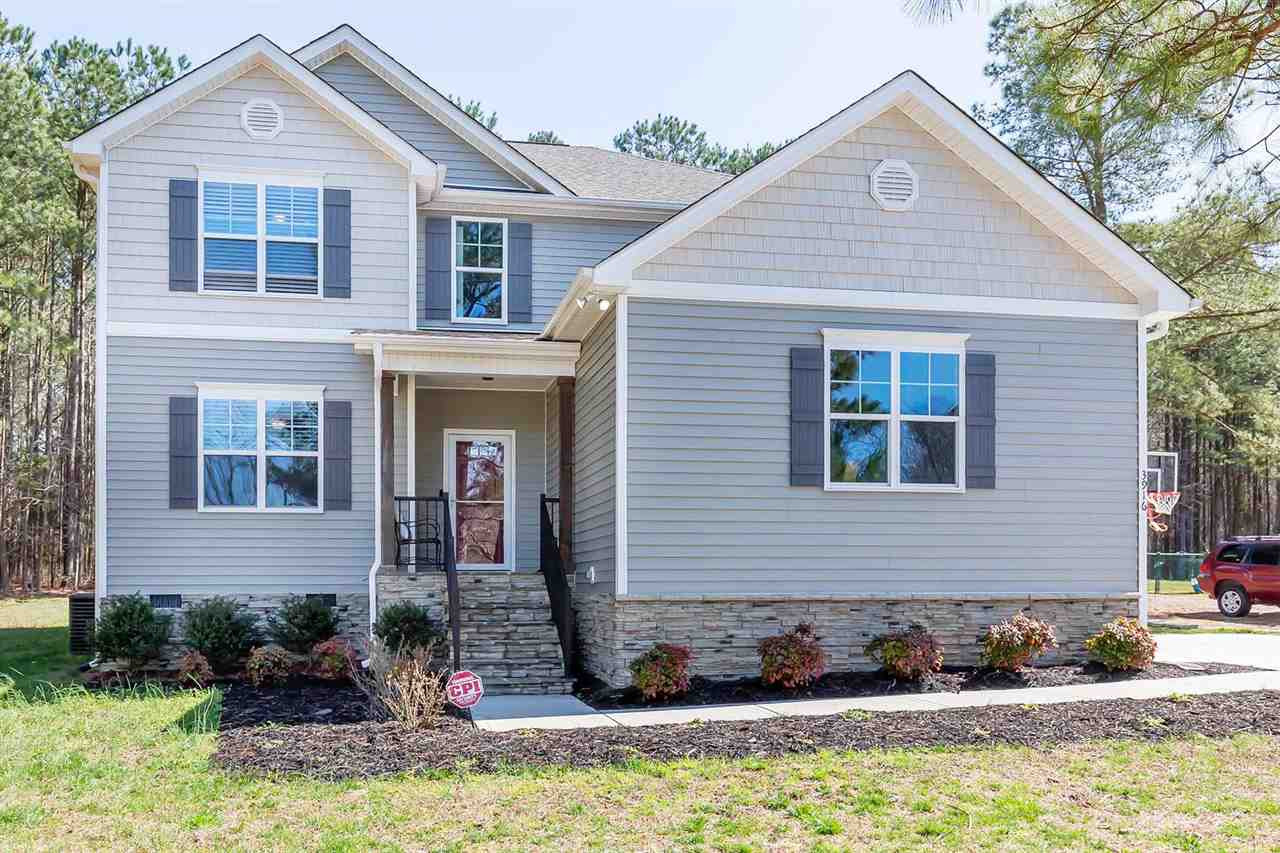3916 Pecan Grove Road Zebulon, NC 27597 - Photo 1 of 30 Built 2016, beautiful 1st flr Master on 1.24 wooded acres in countryside, near Hwy 264 for easy commute! Exterior Front