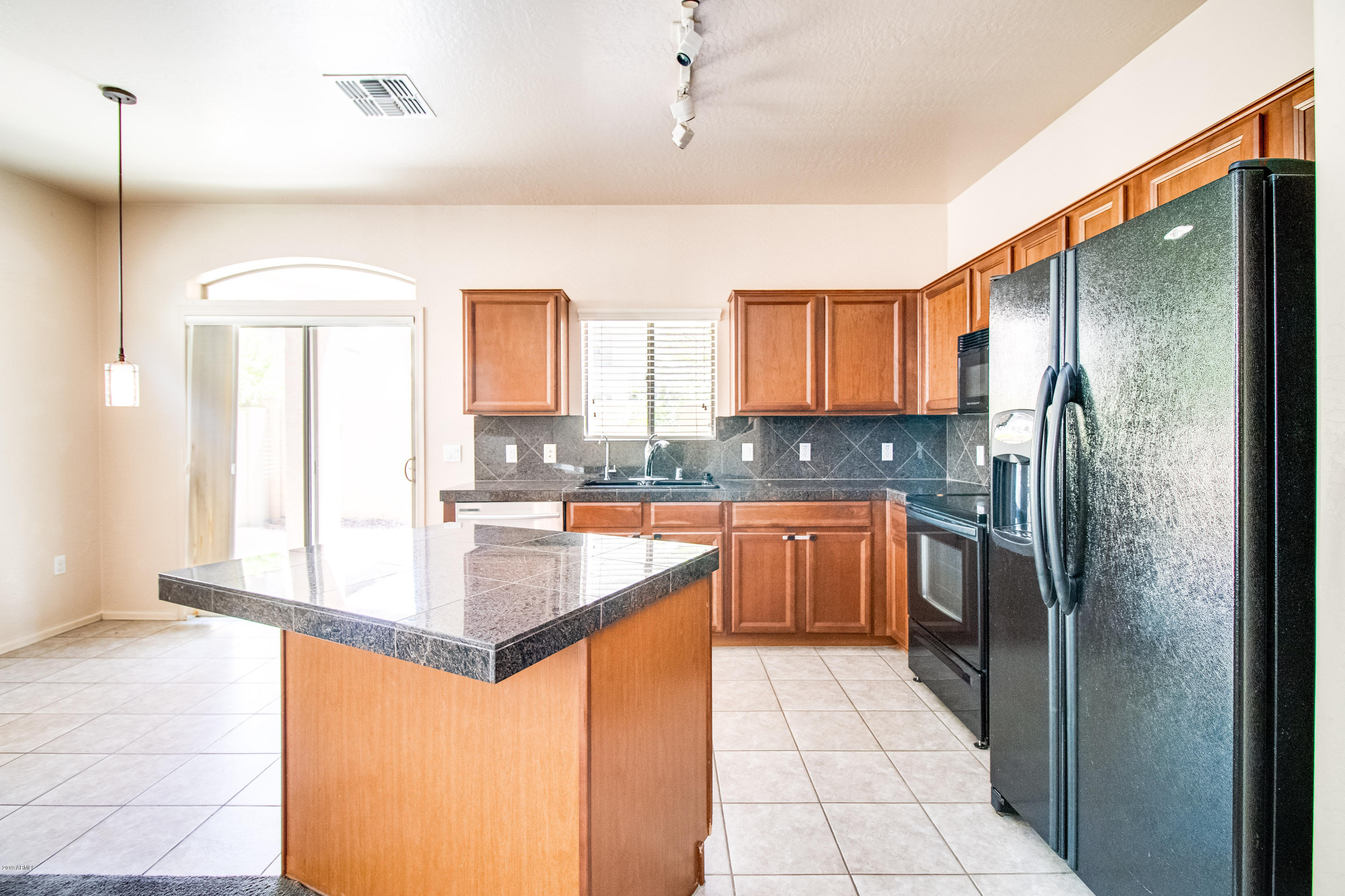 2150 East Bell Road, Unit 1102 Phoenix, AZ 85022 - Photo 12 of 33 Kitchen Island