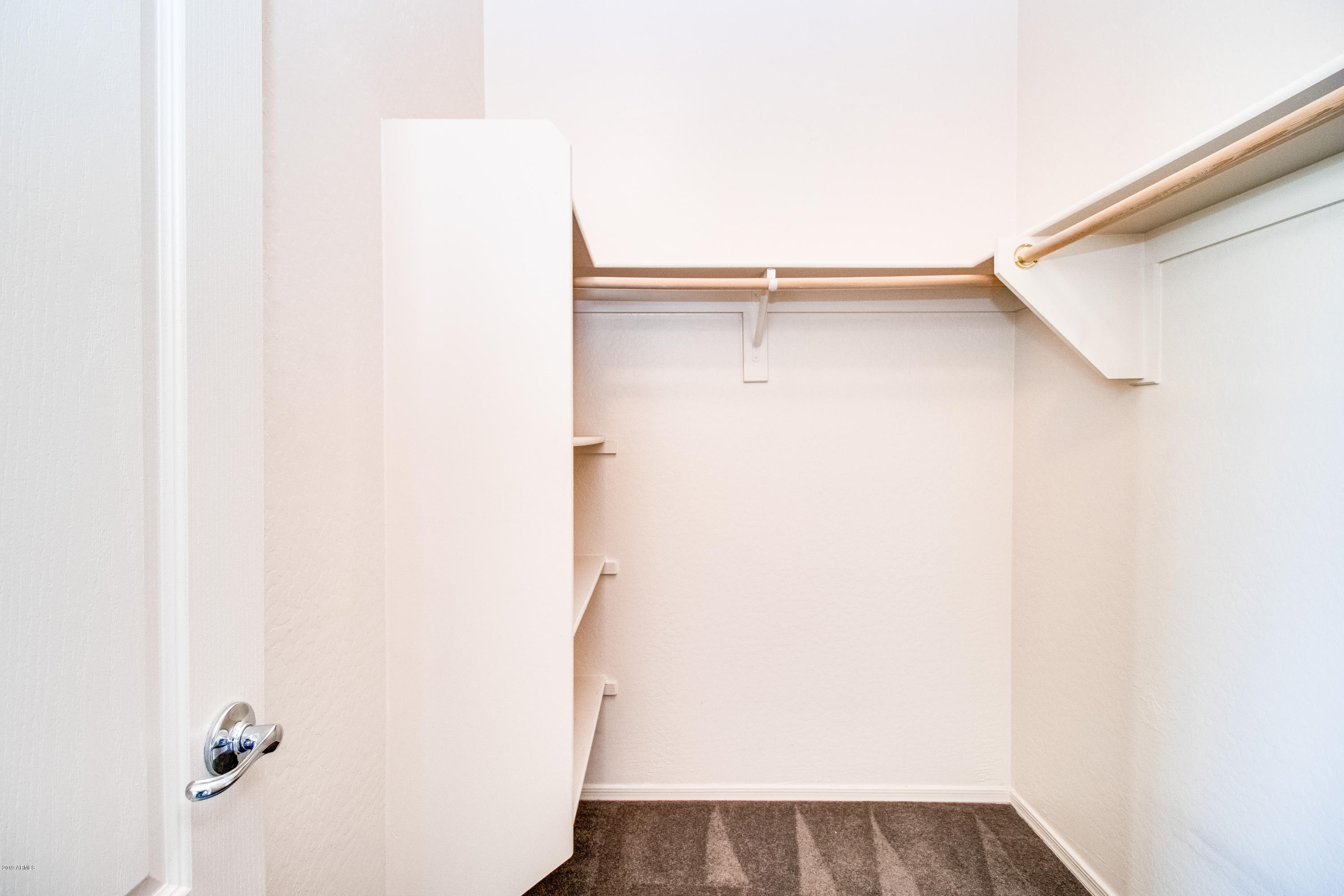 2150 East Bell Road, Unit 1102 Phoenix, AZ 85022 - Photo 18 of 33 Master Bedroom Walk-In Closet