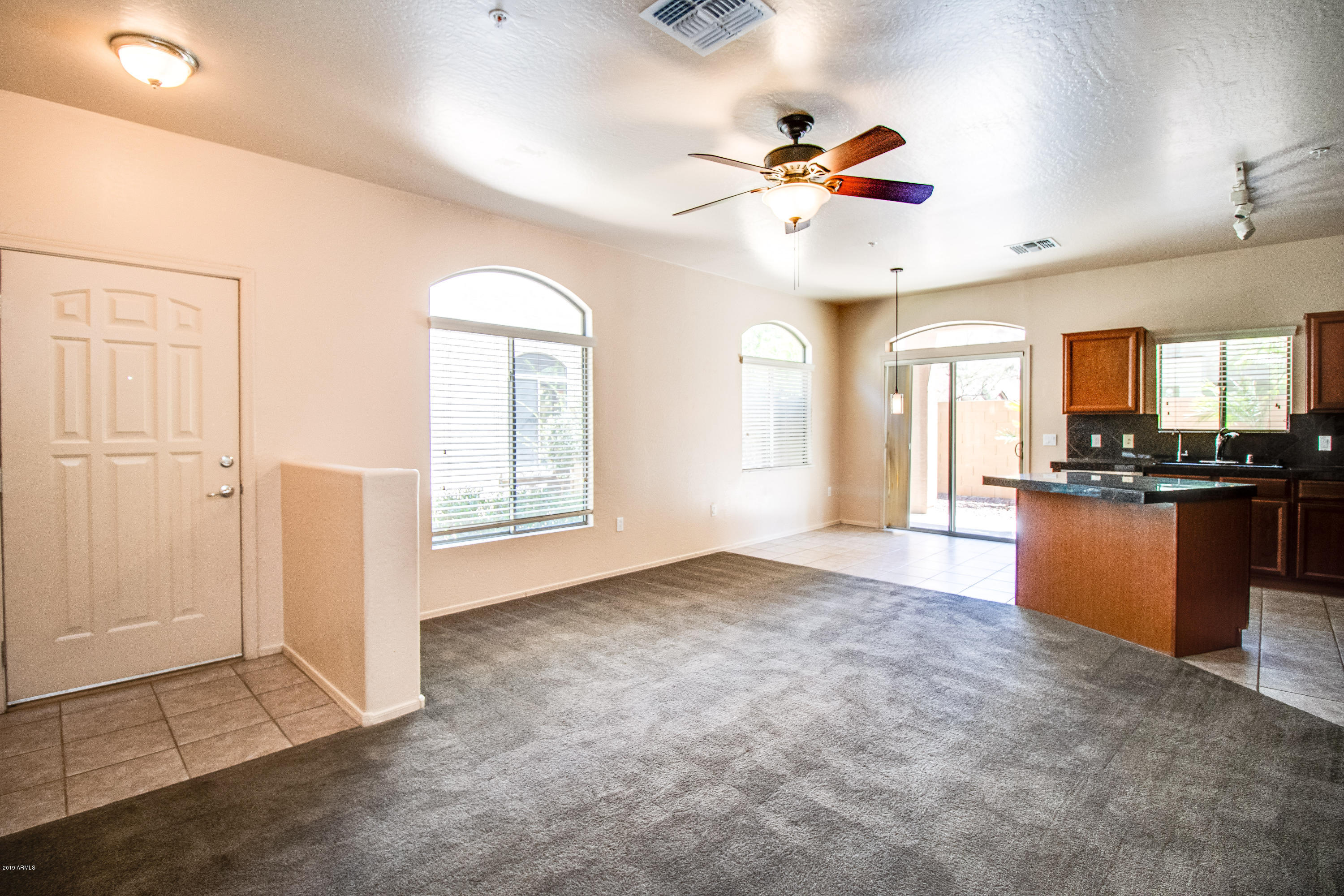 2150 East Bell Road, Unit 1102 Phoenix, AZ 85022 - Photo 10 of 33 Living Room & Kitchen