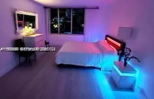 a bathroom with a double vanity sink and mirror