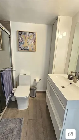 a view of a swimming pool with an outdoor space and seating area