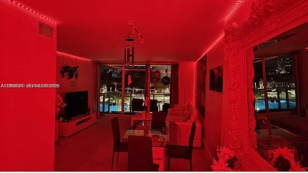 a view of a swimming pool with an outdoor seating