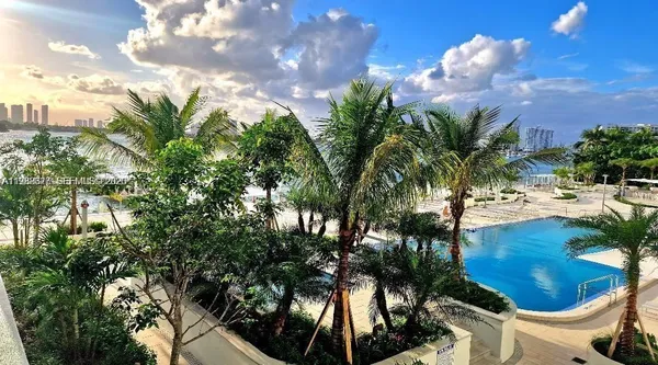 a view of kitchen with table and chairs