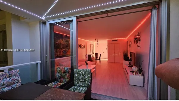 a bedroom with a bed and a mirror