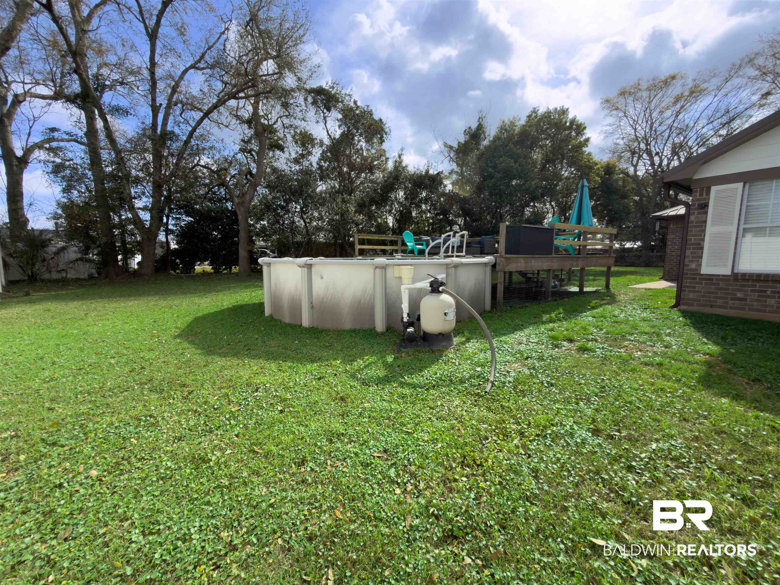 129 Pennbrooke Loop Foley, AL 36535 - Photo 42 of 44 View of green lawn with an outdoor pool