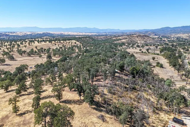 a view of a road with a building in the background