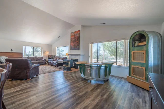 a kitchen with a stove sink and cabinets