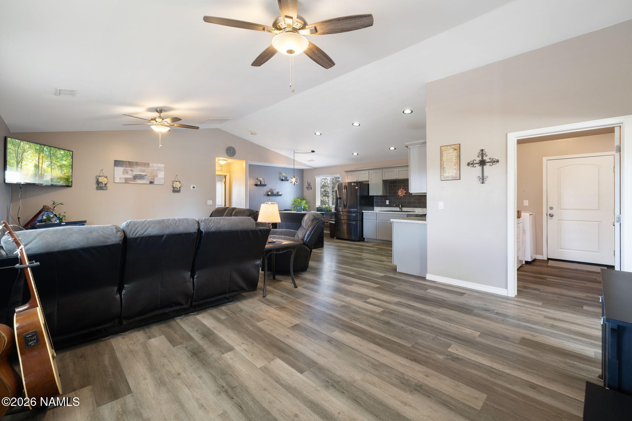 6339 North Bluefield Road Flagstaff, AZ 86004 - Photo 11 of 35 a living room with furniture and a wooden floor