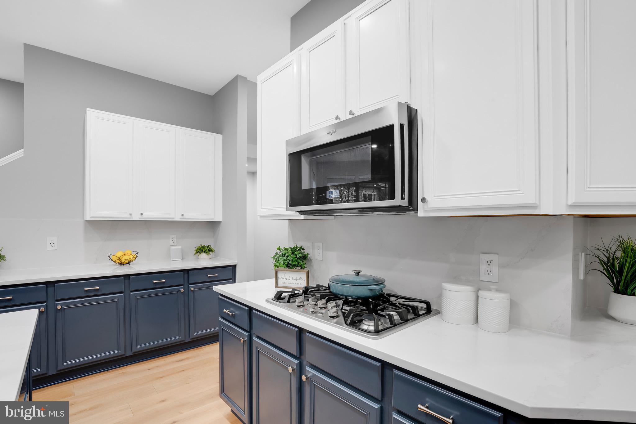 9825 Garden Ranges Laurel, MD 20723 - Photo 17 of 46 Gas Cooktop | Quartz Counters | Dual Toned Cabinet