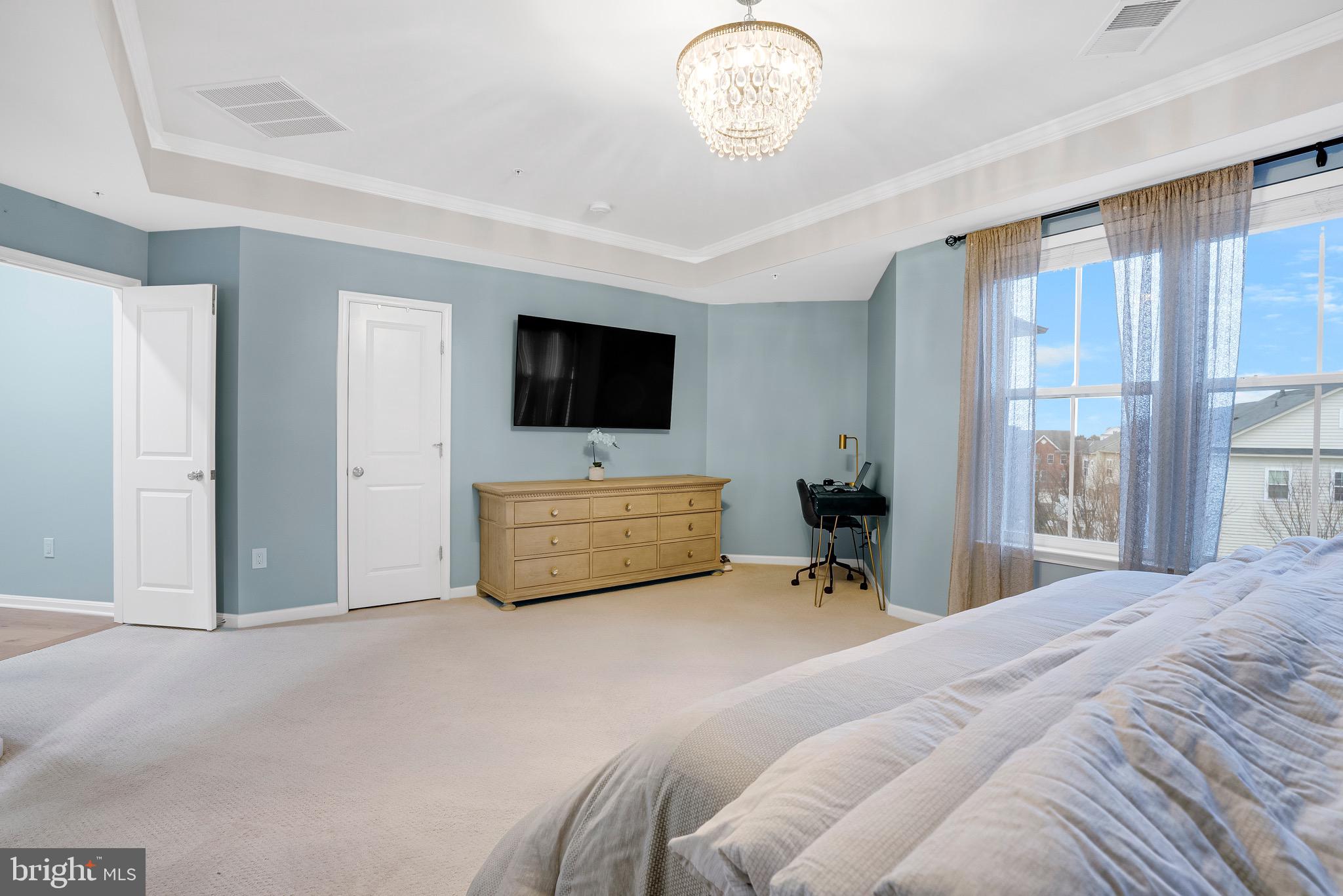 9825 Garden Ranges Laurel, MD 20723 - Photo 27 of 46 Walk in Closet | Chandelier | Tray Ceilings