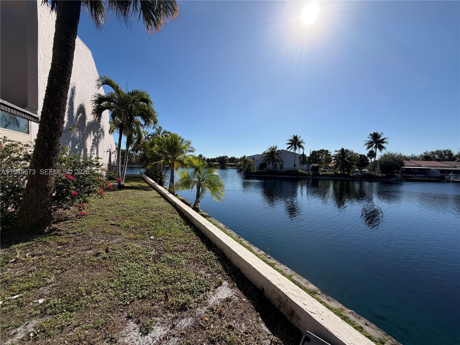 7216 Jacaranda Lane Miami Lakes, FL 33014 - Photo 7 of 17 side view lake