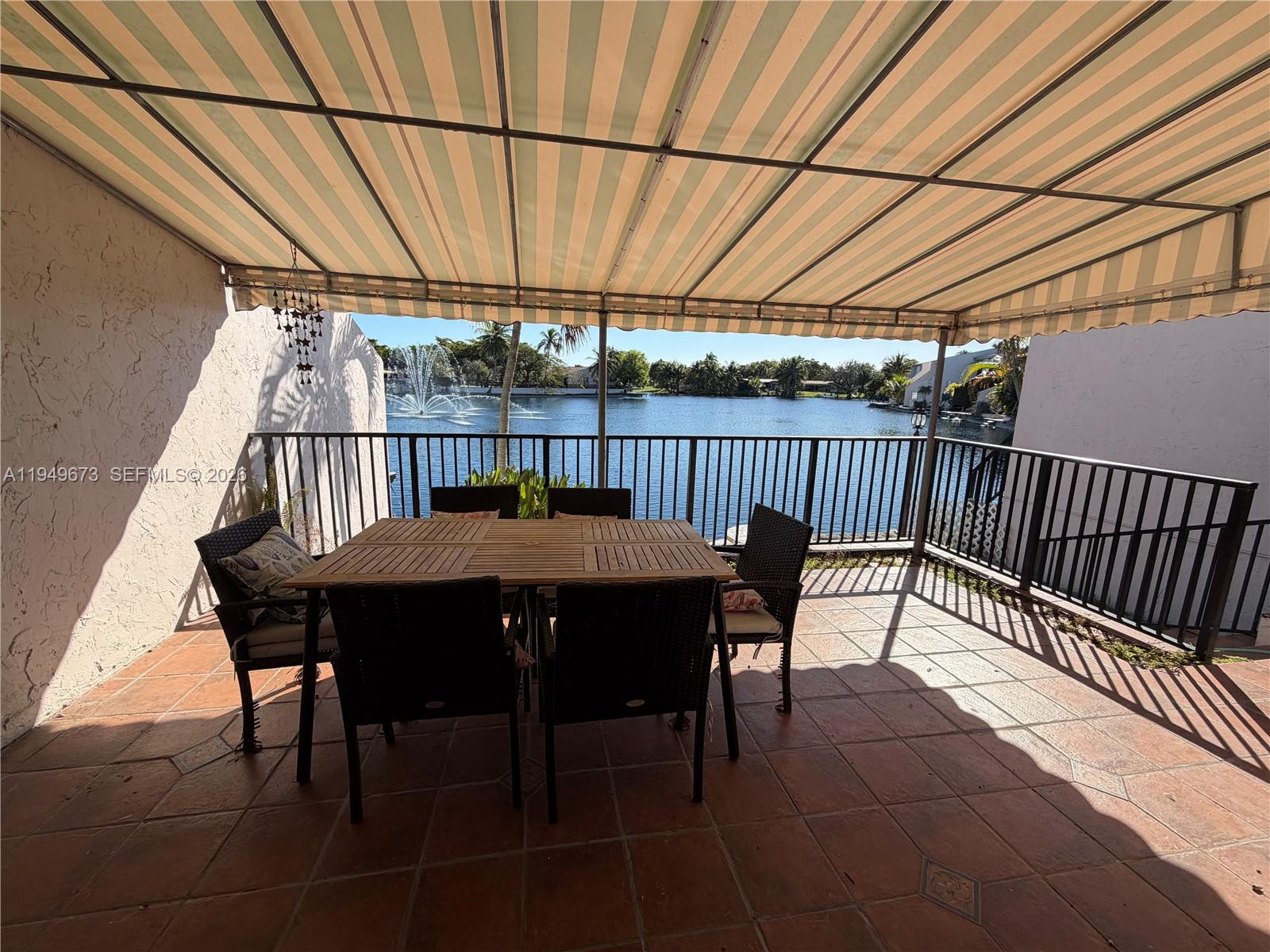 7216 Jacaranda Lane Miami Lakes, FL 33014 - Photo 9 of 17 patio lake view