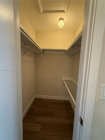 a bathroom with a toilet a sink and bathtub