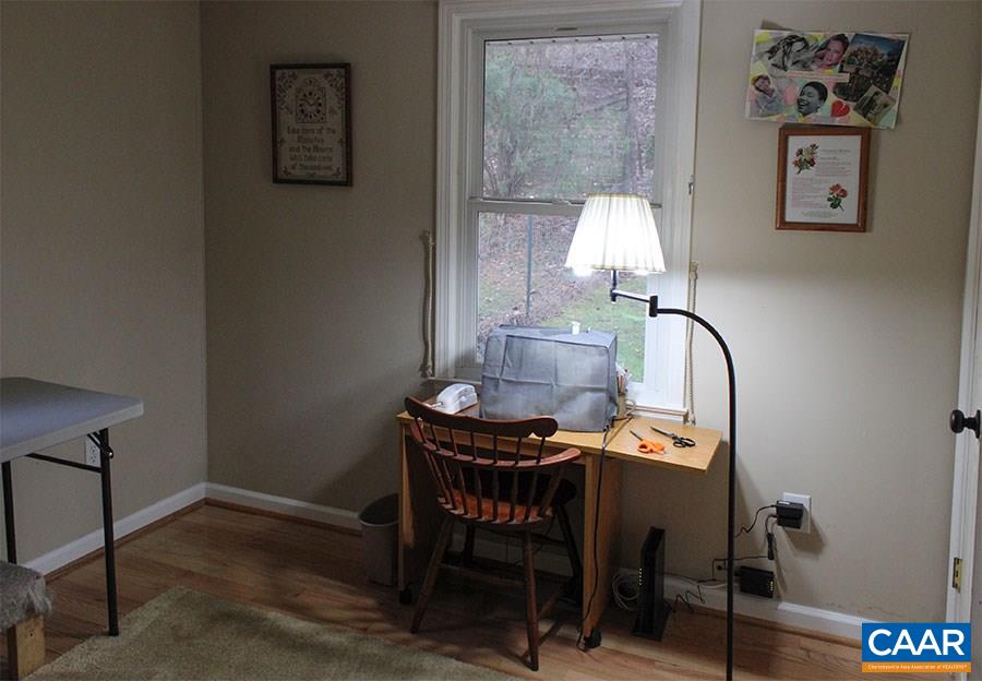 2468 Craigs Store Road Afton, VA 22920 - Photo 14 of 24 a view of a workspace room with furniture and wooden floor