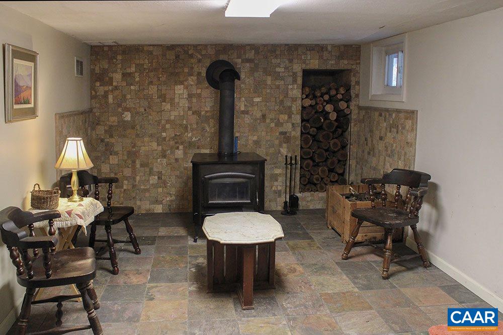 2468 Craigs Store Road Afton, VA 22920 - Photo 16 of 24 a view of a room with furniture and chandelier
